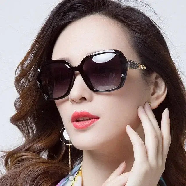 Stylish woman wearing oversized sunglasses with dark lenses and unique frame design, showcasing trendy sunglasses.