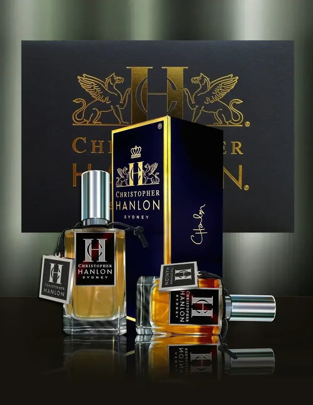 Perfume collection featuring Christopher Hanlon bottles and packaging in elegant display.