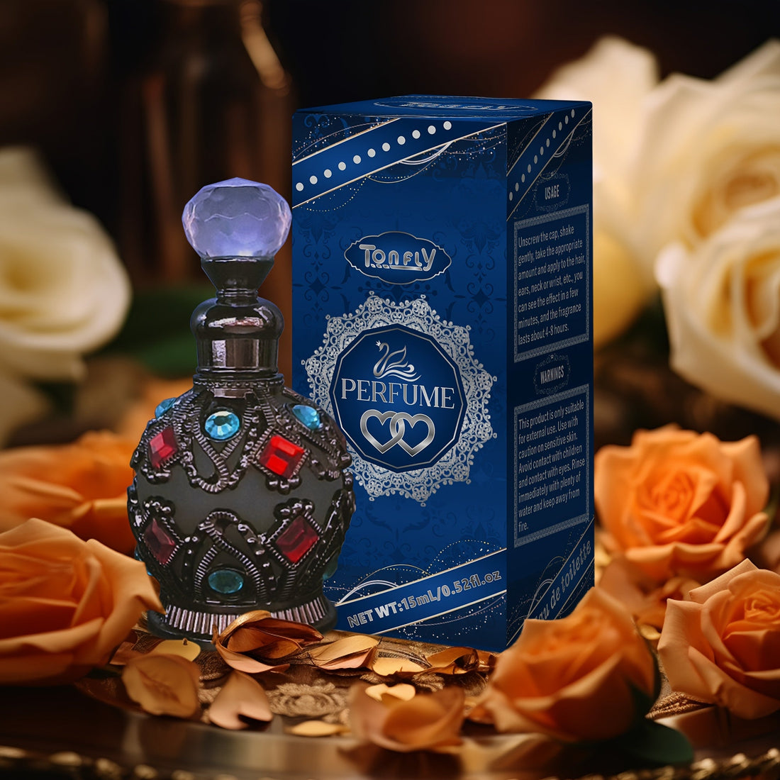 NNETM Enchanted Arabian Dreams Essential Oil Perfume bottle with ornate design and blue packaging surrounded by roses.