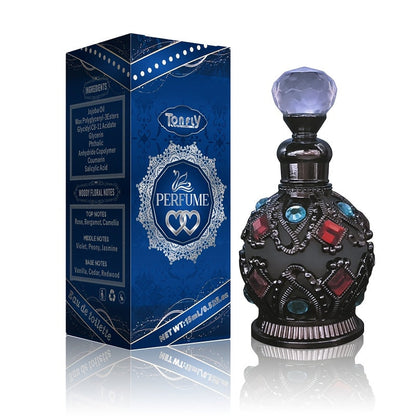 NNETM Enchanted Arabian Dreams Essential Oil Perfume in ornate bottle with blue cap and decorative box.