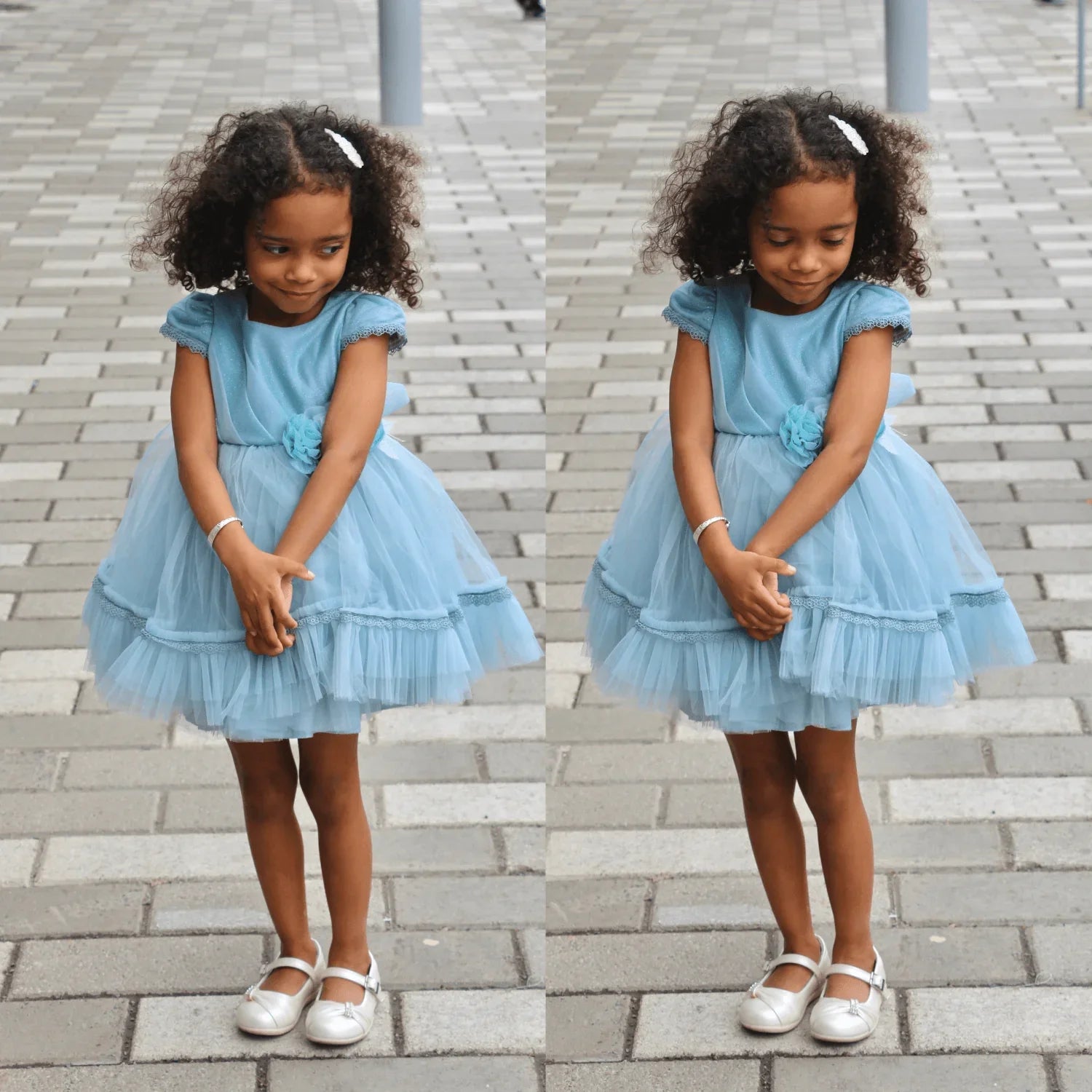 Bright Flower Girls Formal Dress worn by a young girl with curly hair, featuring cap sleeves, tulle skirt, and flower detail.