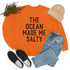 The Ocean Made Me Salty sweatshirt in vibrant orange, styled with jeans and a cozy beanie.