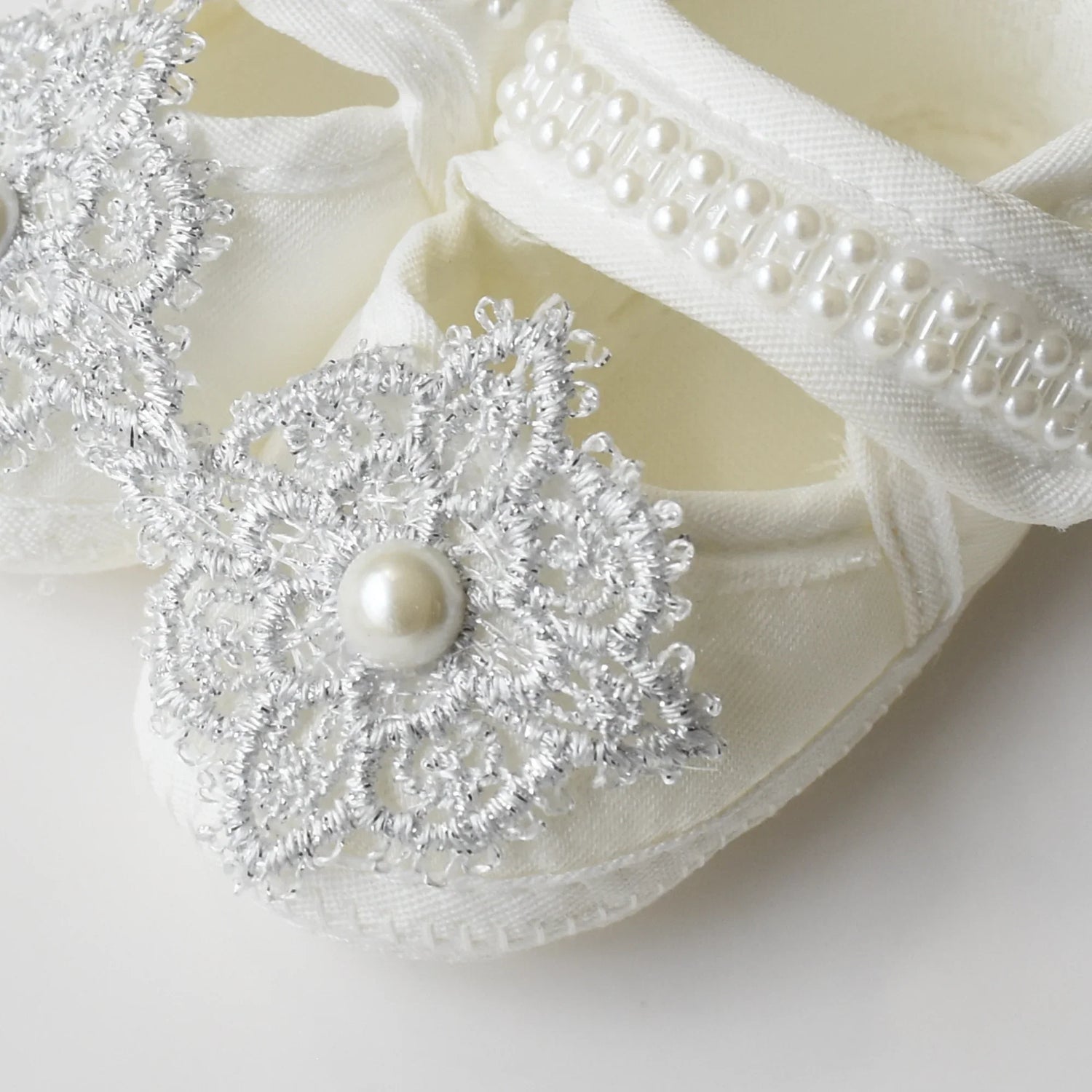 Baby Bliss Baby Shoes Set featuring elegant silver lace and pearl embellishments on soft baby shoes.