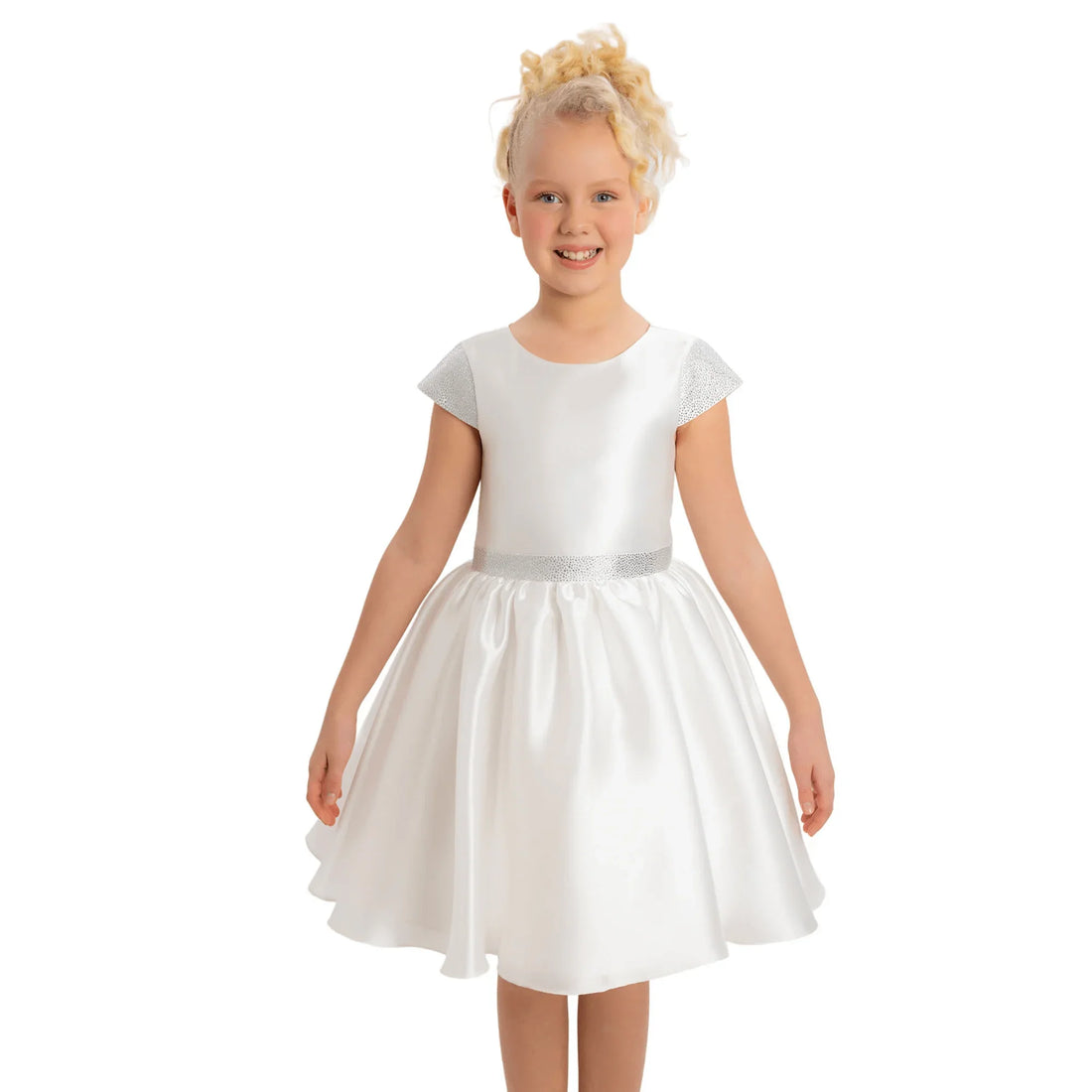 Girls Dress Pure Radiance Girls Formal Dress featuring a girl in a white organza dress with silver accents and a joyful smile.