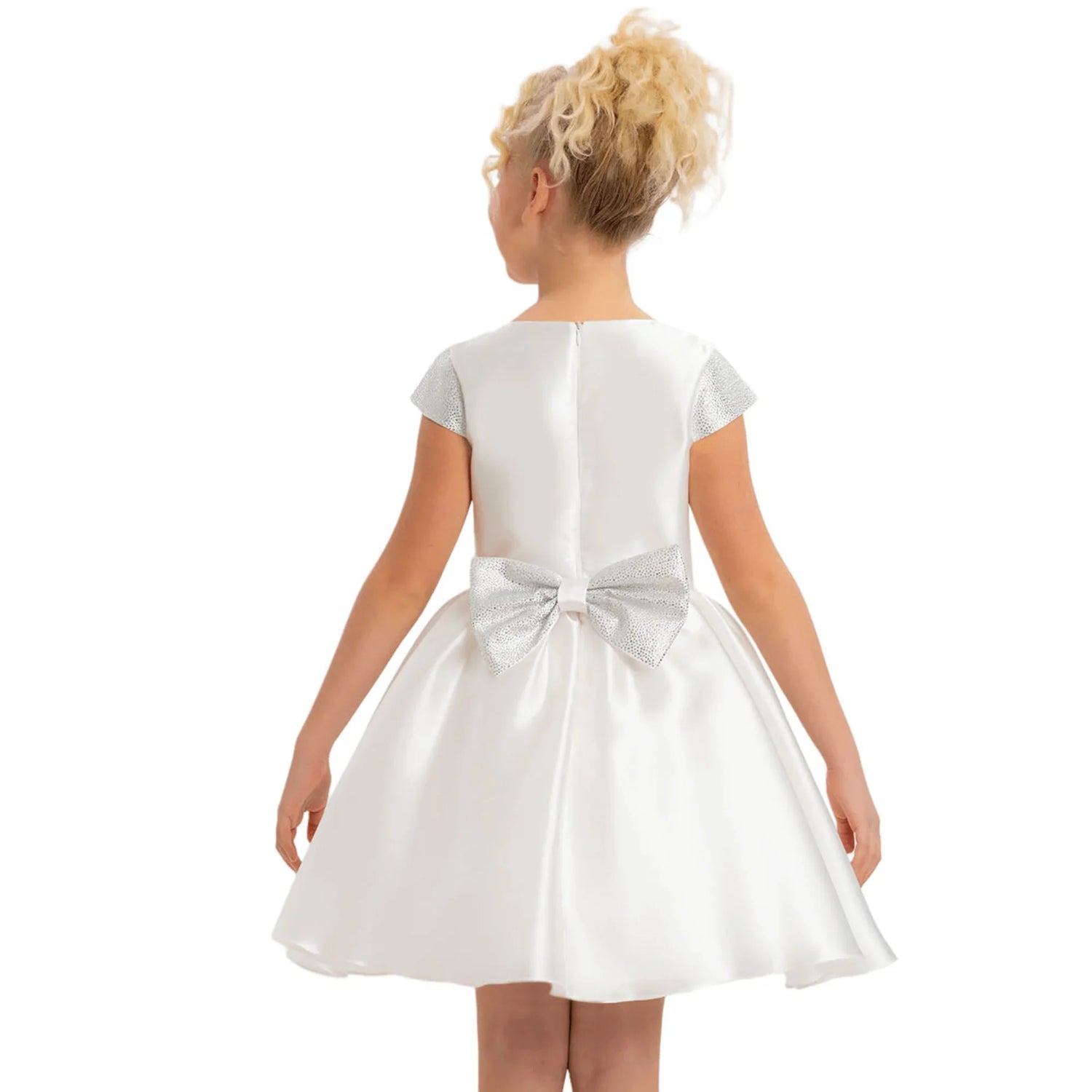 Girls Dress Pure Radiance Girls Formal Dress showcasing back view with silver bow detail on a young girl.