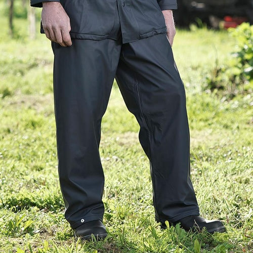 Mens Fort Flex Trousers - 920 worn outdoors, showcasing waterproof design and practical functionality.