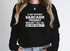 A Day Without Sarcasm Sweat Shirt featuring a humorous quote on a black background.
