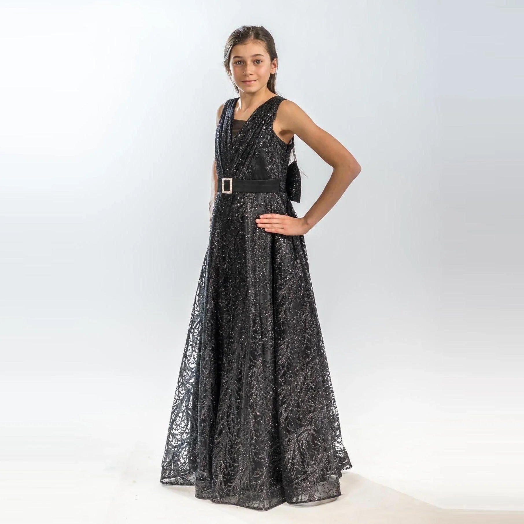 Sparkling Beauty Girls Formal Dress featuring a stunning long black tulle design with sequins and a mock waist belt.