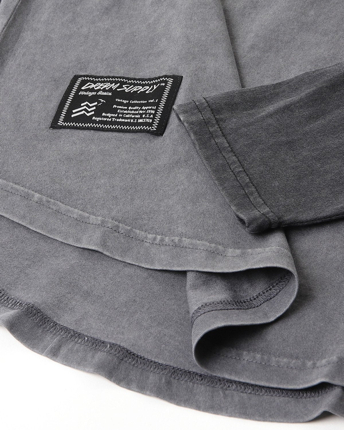 ZIMEGO Mens Athletic Fit Baseball Retro Contrast Long Sleeve Raglan T-Shirt close-up showing garment label and fabric texture.