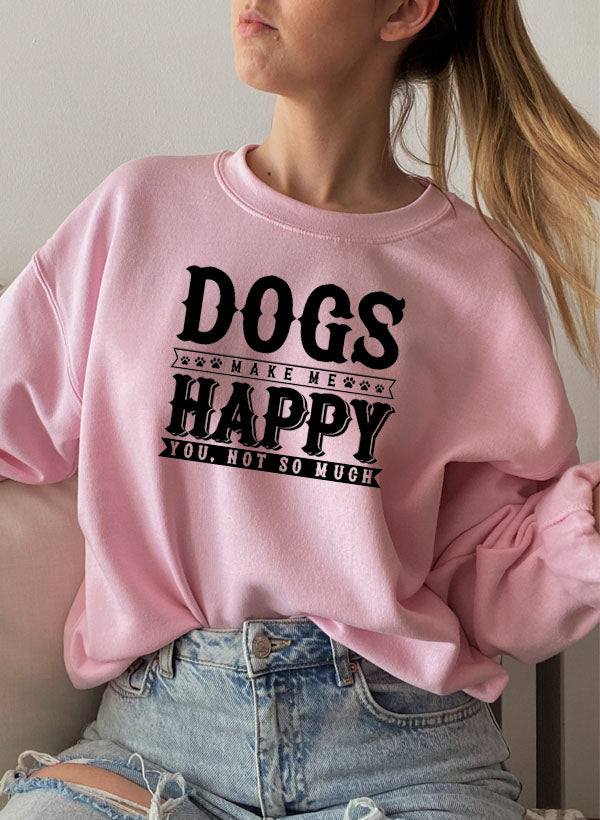 Dogs Make Happy Sweat Shirt in pink with a fun graphic design worn by a model