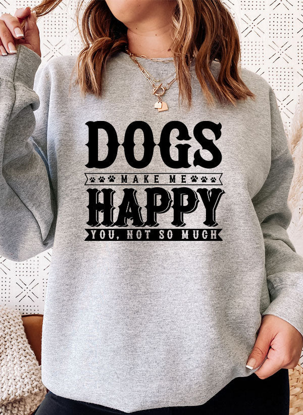 Woman wearing Dogs Make Happy Sweat Shirt with a playful design in grey.
