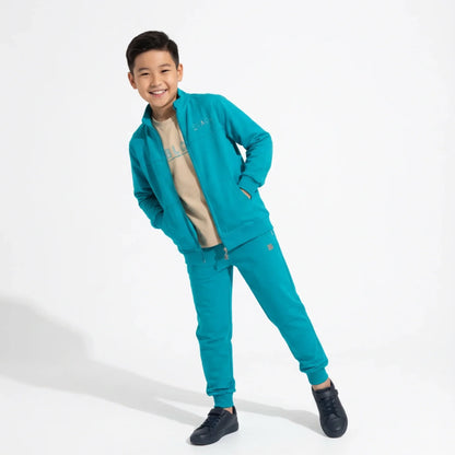 Zip-Up Tracksuit Unisex Casual Set on a young boy wearing a teal zip-up jacket and matching jogger pants.