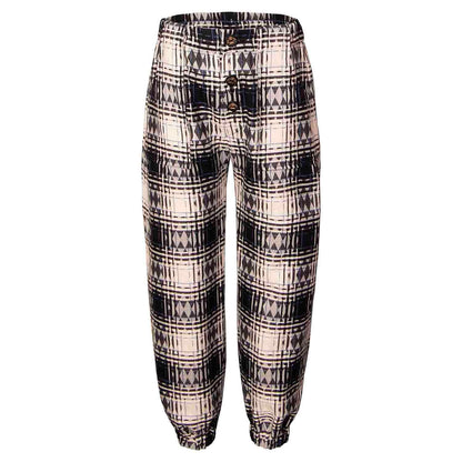 Kids Pants in Black &amp; White Tartan featuring a classic tartan pattern and wide-leg silhouette.