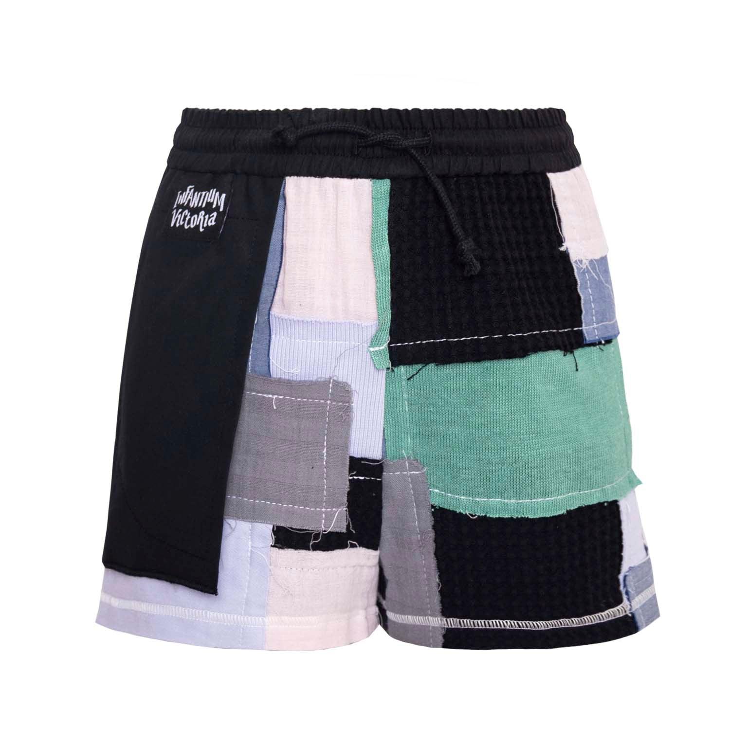 Zero Waste Patchwork Shorts featuring colorful patchwork design and adjustable drawstring.
