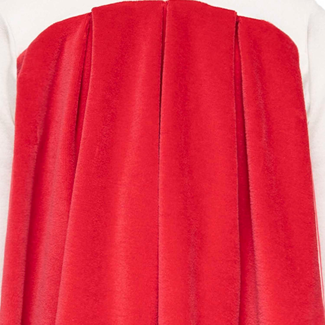 Back detail of the Baby Dress in White and Red featuring elegant red fabric draping.