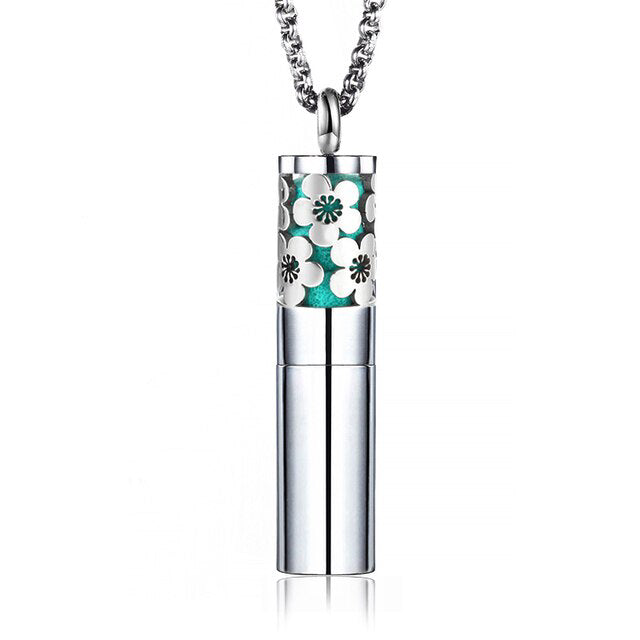 Designer floral perfume locket necklace with floral design and silver finish, perfect for carrying your favorite scents.