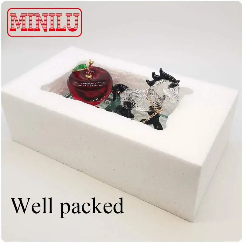 Crystal Perfume Seat Car Decoration Horse in a well-packed box with a red apple.