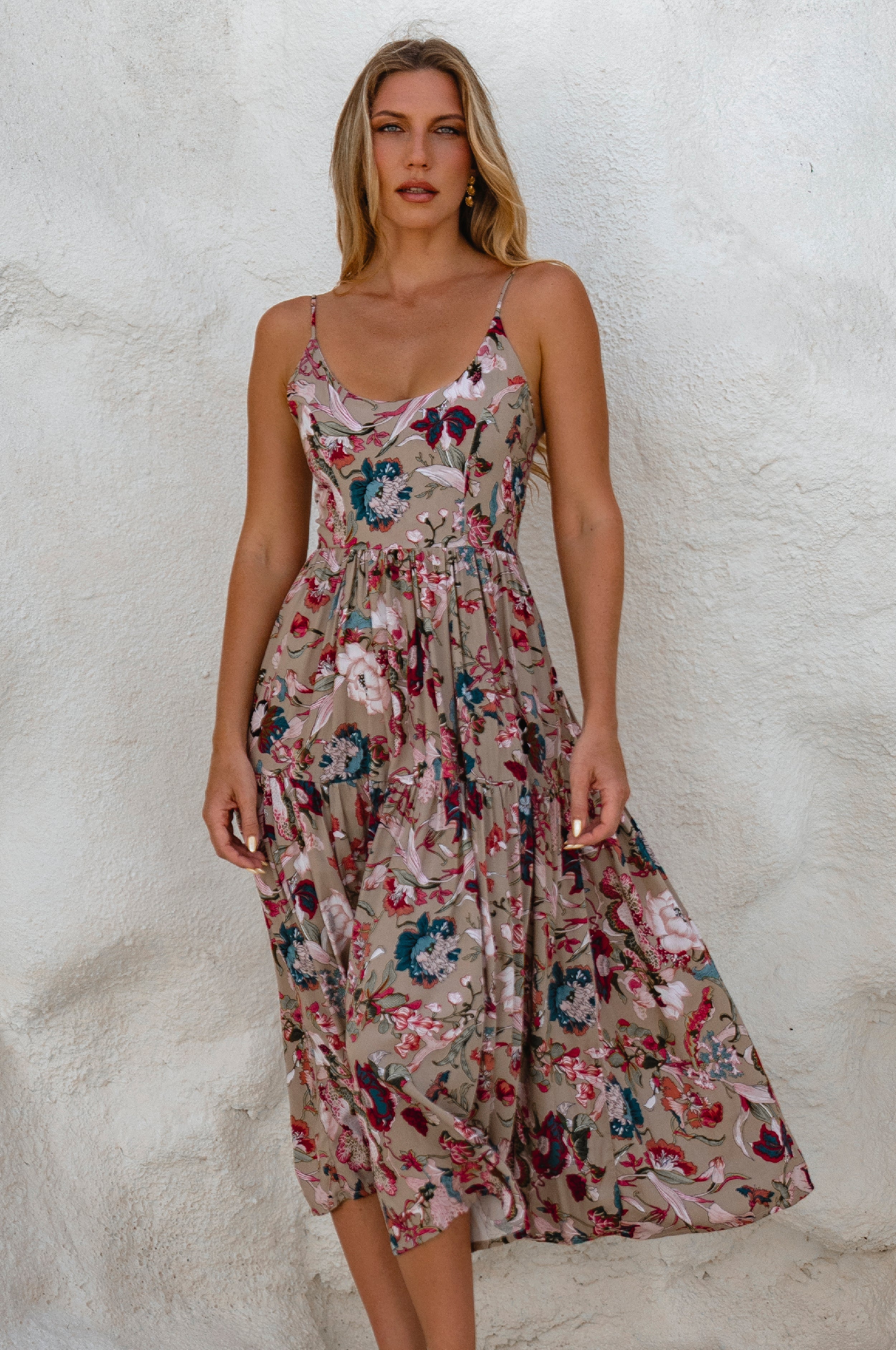 Sea Dreamer Strappy Midi Dress featuring floral design, smocked back, and flowy two-tier skirt, perfect for summer outings.