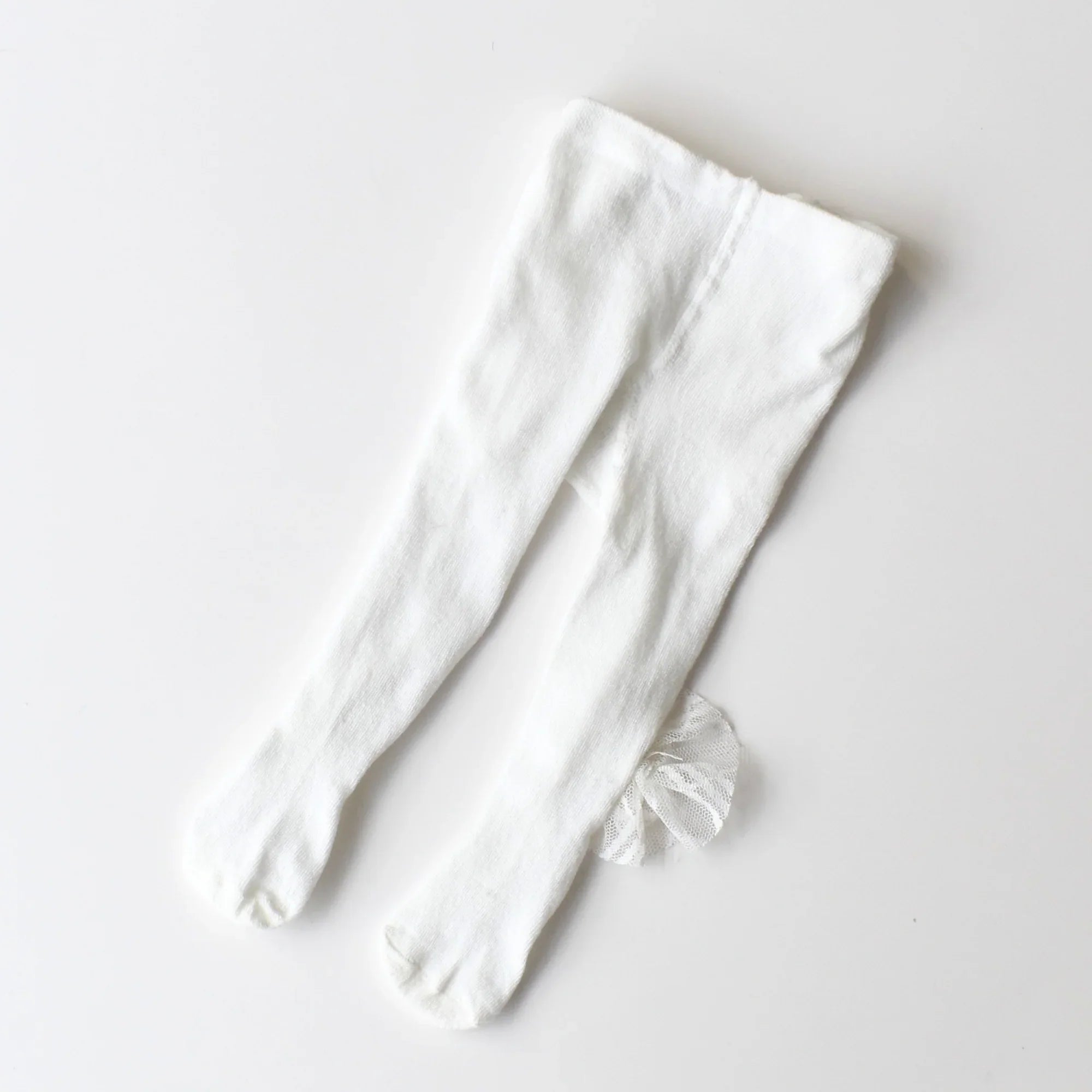 Baby Bliss Baby Shoes Set cozy white tights with a delicate bow, perfect for adding elegance to your baby&