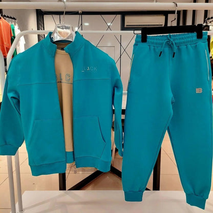 Zip-Up Tracksuit Unisex Casual Set in turquoise, featuring a zip jacket and matching jogger pants on display.