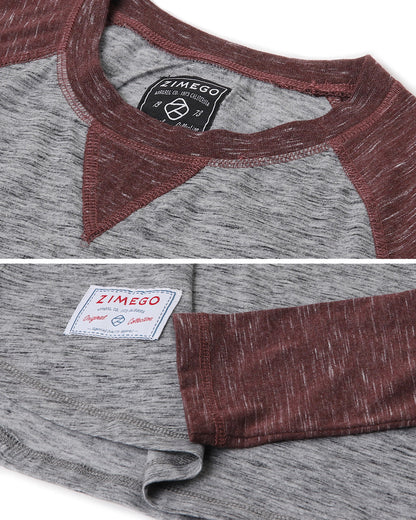 ZIMEGO Men Athletic Fit Baseball Retro Contrast Long Sleeve Raglan T-Shirt close-up showing fabric details and brand label.
