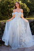 Off The Shoulder Floral Applique Ball Gown with floral embellishments and tulle sleeves in a garden setting.