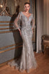 Long Sleeve Mermaid Gown featuring sheer bishop sleeves and glitter tulle for an elegant look.