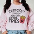 Exercise I Thought You Said Extra Fries sweatshirt on a model with black pigtails, cozy and stylish.