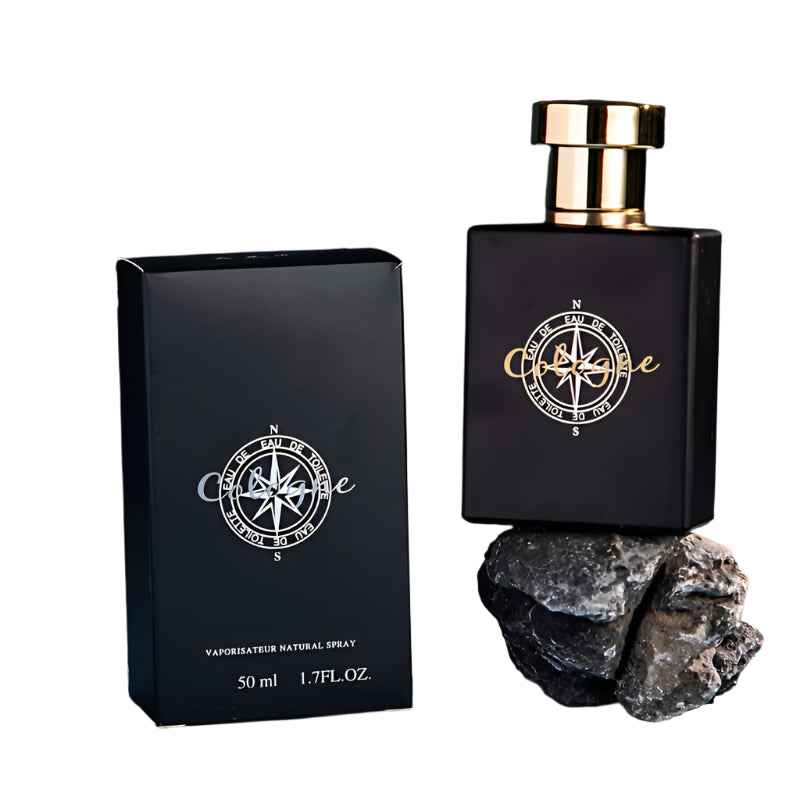 Cologne Ocean Perfume for Men &amp; Women 50ml bottle and box on rocks, long-lasting woody floral fragrance.