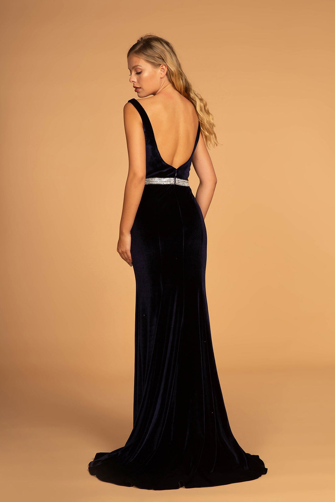 Jewel Accented Waist Line V-Neck Velvet Dress w/ U-Back showcasing an elegant open back and fitted velvet silhouette.