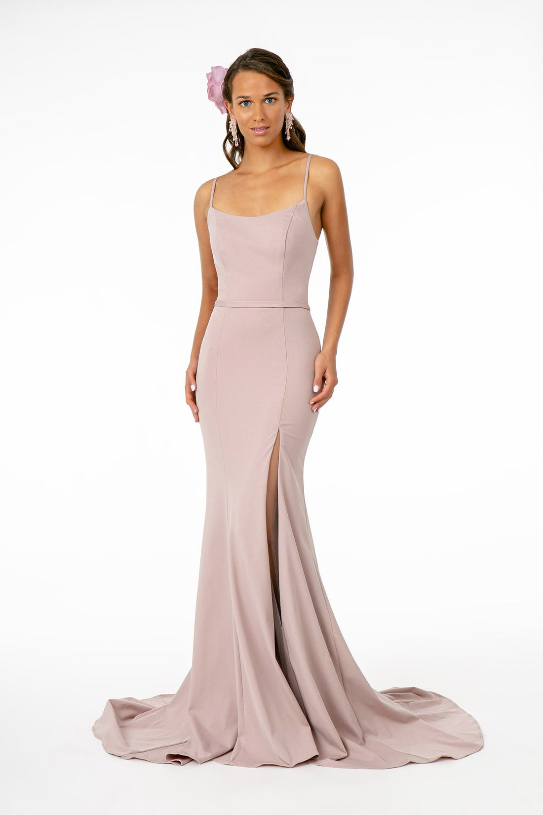Model wearing Rome Jersey Illusion Side Slit Long Dress in mauve with spaghetti straps and open back.