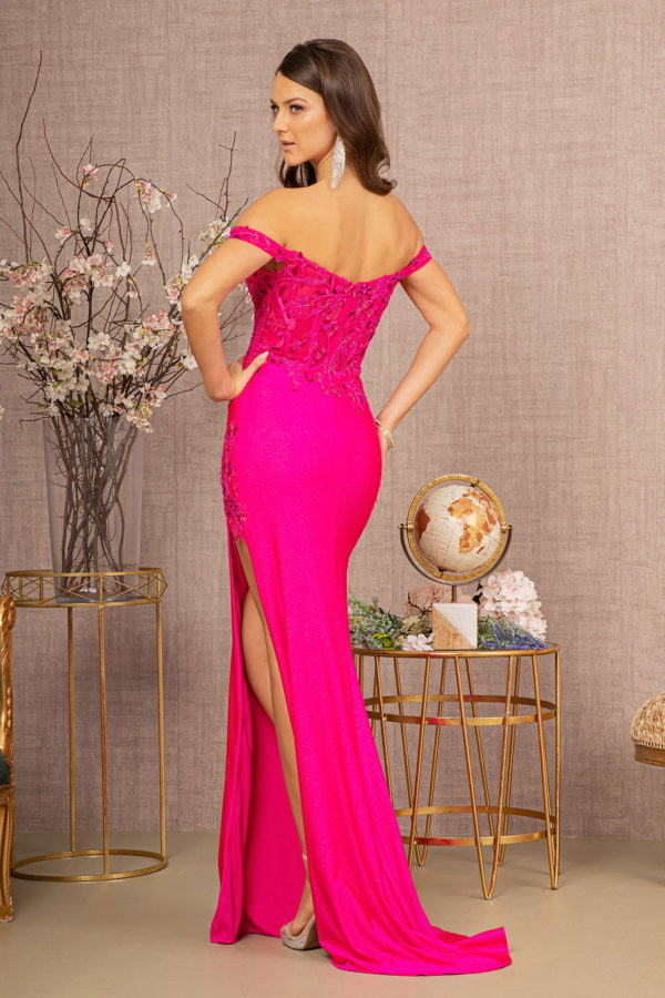 Glitter Sheer Mermaid Dress Off Shoulder in vibrant pink showcasing its back with sheer bodice and thigh-high slit.