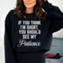 Woman wearing a cozy sweatshirt that says "If You Think I&
