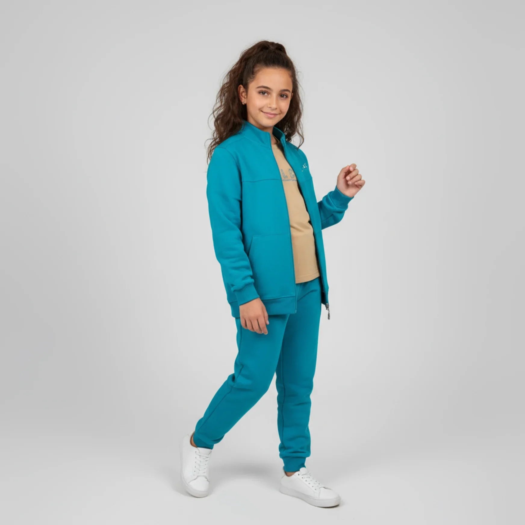 Zip-Up Tracksuit Unisex Casual Set in aqua blue worn by a girl with a smile and stylish pose.
