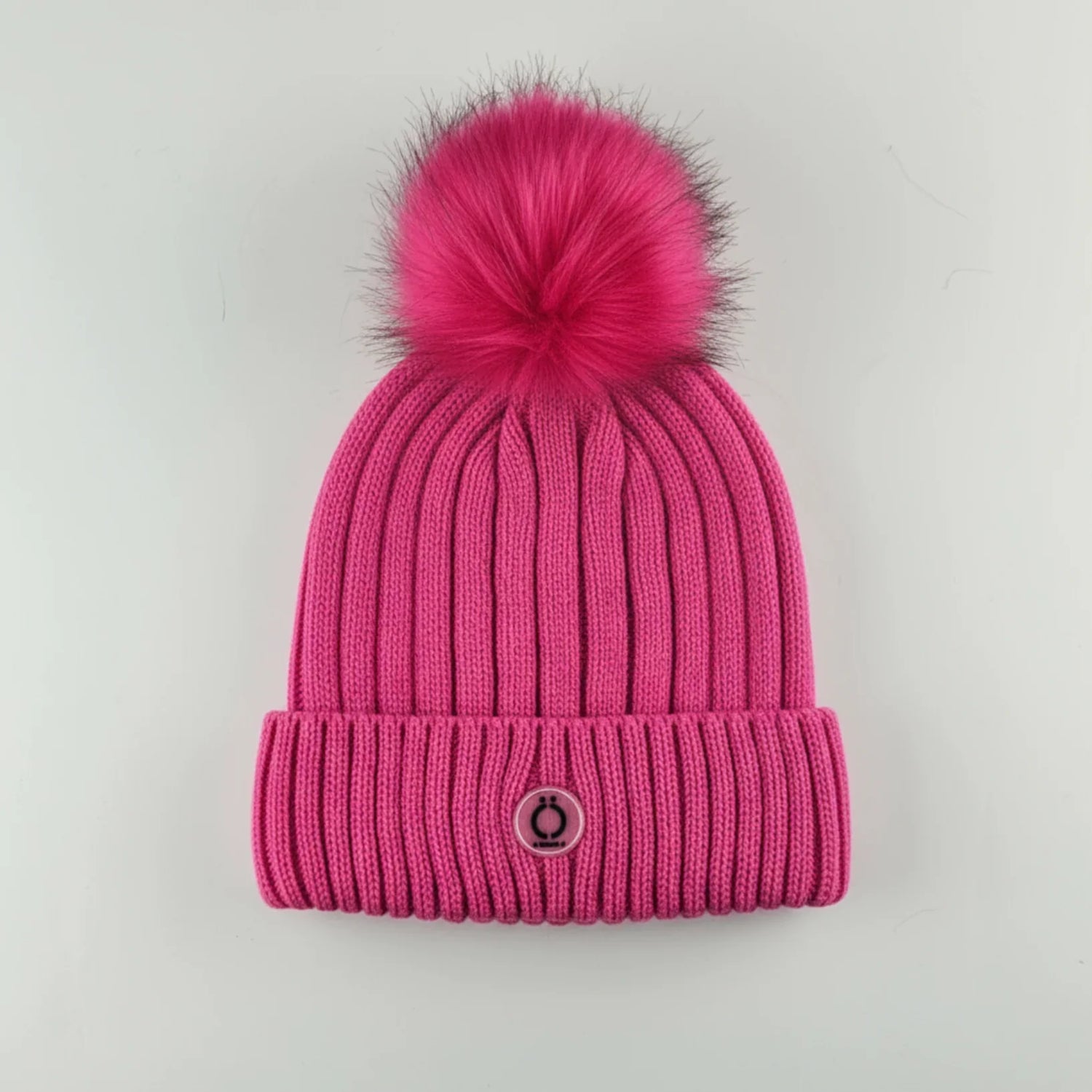 Fushia Tuque with soft long fur pompom and polar fleece lining, featuring a removable pompom for color options.