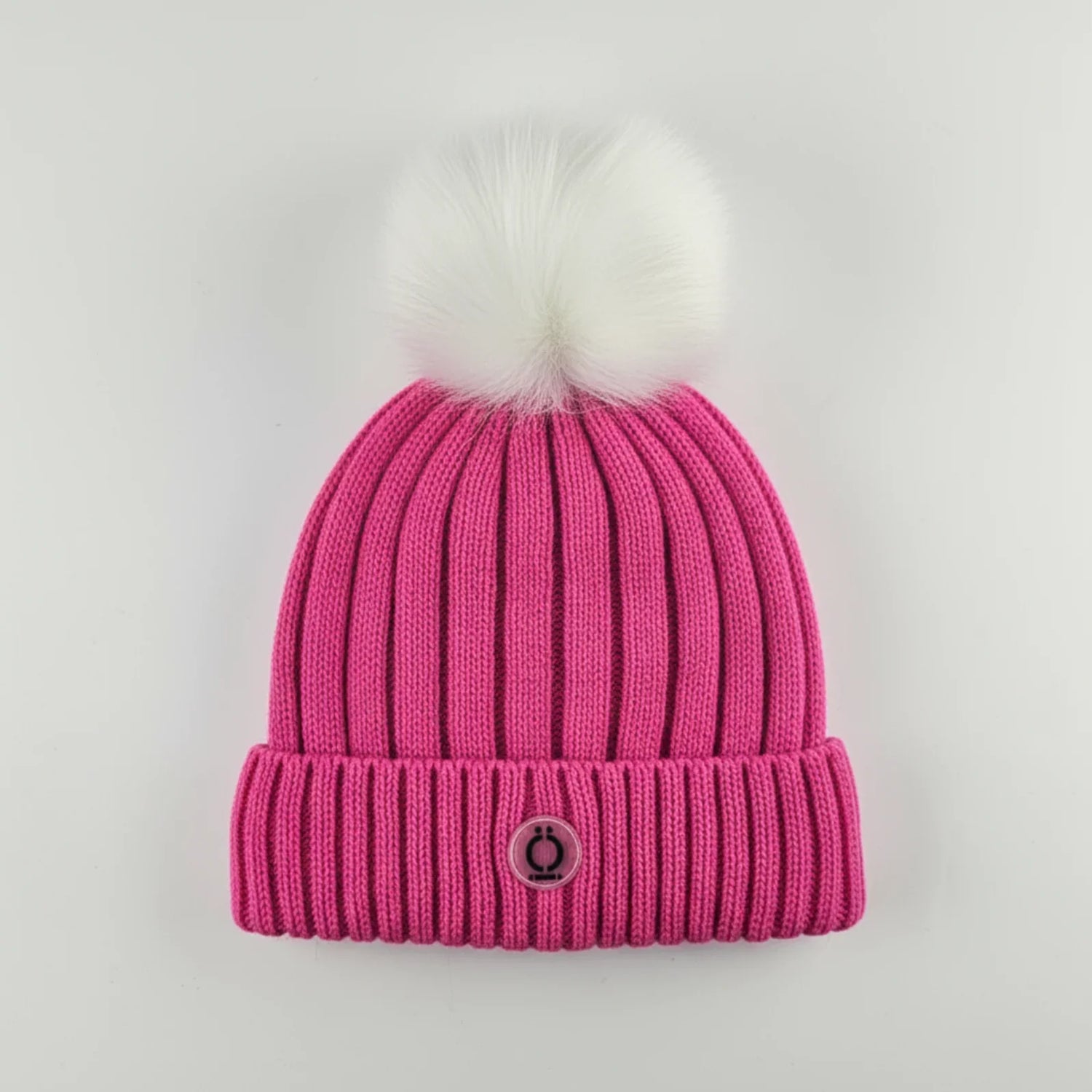Fushia Tuque knit hat with soft white fur pompom and polar fleece lining.