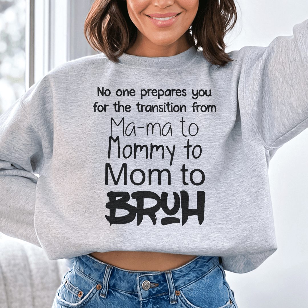 No One Prepares You for The Transition from Mama to stylish sweatshirt featuring a cozy fleece blend and unique artist design.