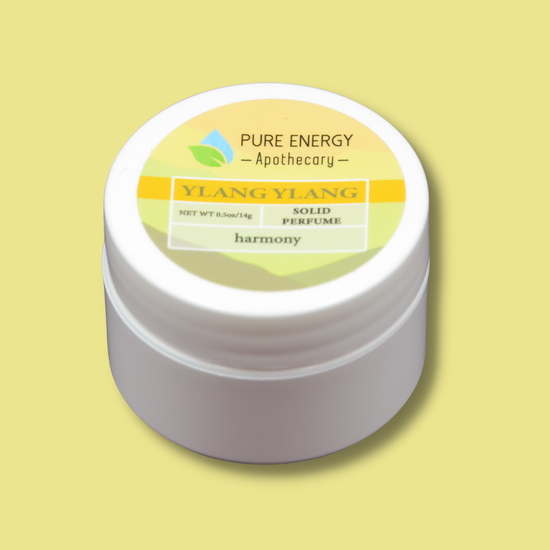 Solid Perfume .50oz - Ylang Ylang by Pure Energy Apothecary in a compact jar.